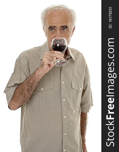 Pensioner enjoying glass of red wine. Pensioner enjoying glass of red wine