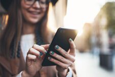 Closeup Technology Smartphone Online Connect. Traveler Woman Holding In Hands Mobile Phone. Girl Tourist In Glasses Using Gadget Royalty Free Stock Image Closeup Technology Smartphone Online Connect. Traveler Woman Holding In Hands Mobile Phone. Girl Tourist In Glasses Using Gadget Royalty Free Stock Image
