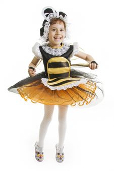 Small Girl Is Bee Costume. Flying Bee. Stock Photo