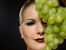 Beautiful Woman With White Grapes Stock Image Beautiful Woman With White Grapes Stock Image