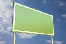 Green Sign In Front Of A Blue Sky Stock Images Green Sign In Front Of A Blue Sky Stock Images