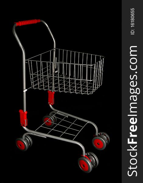 Shopping trolley isolated on black background