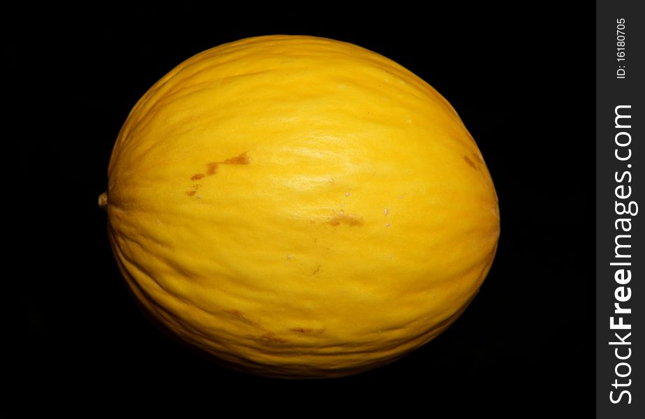 Honeydew melon isolated on a black background