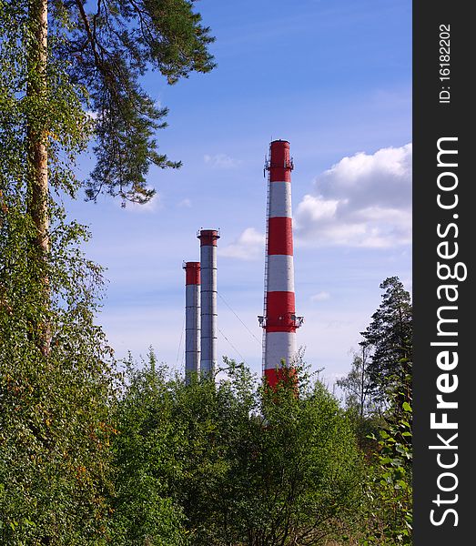 Pipe of thermal power plant and trees