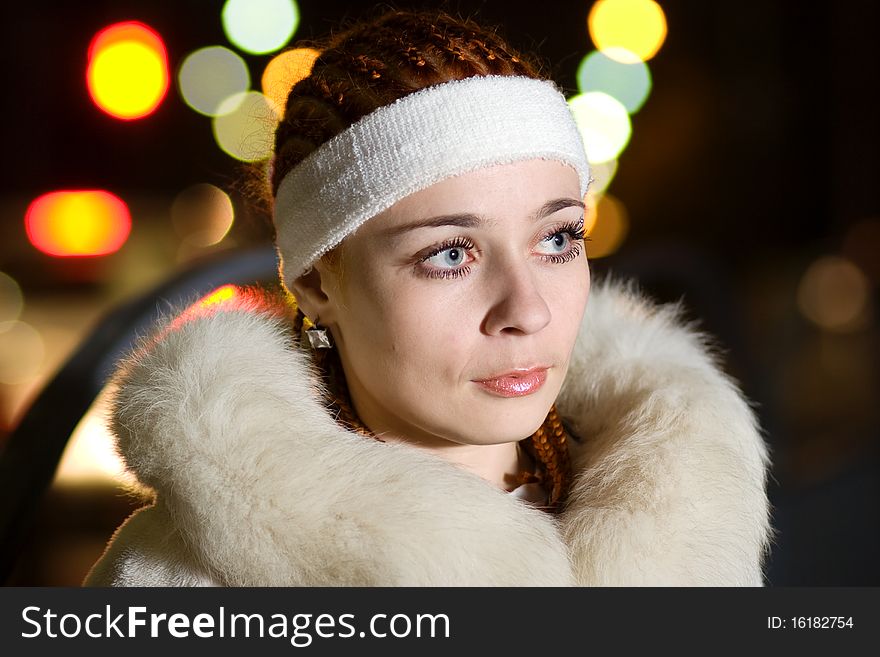 Braided young lady in white fur coat. Braided young lady in white fur coat