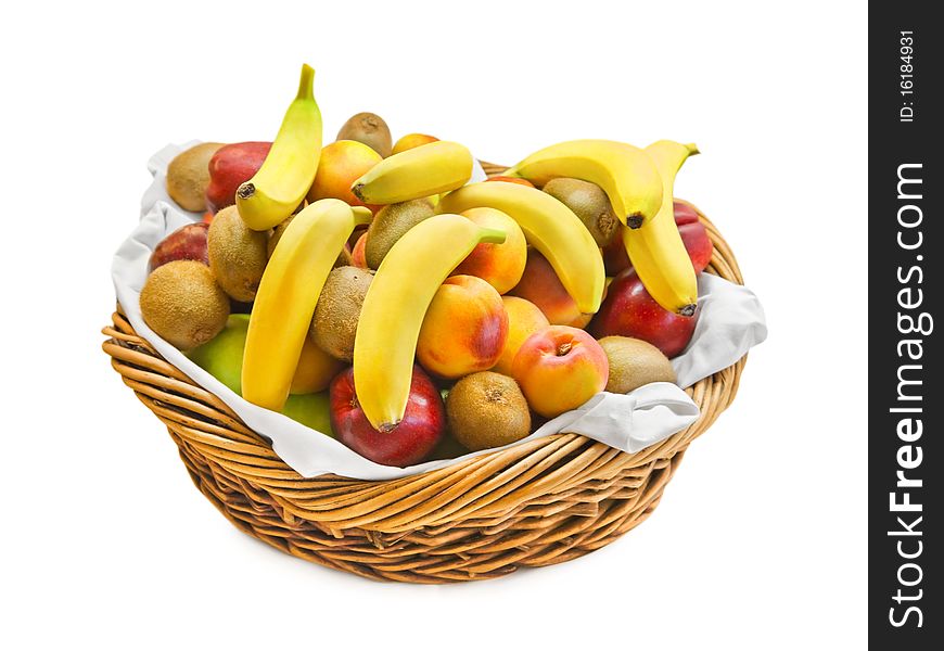 Basket with fruits isolated on white background