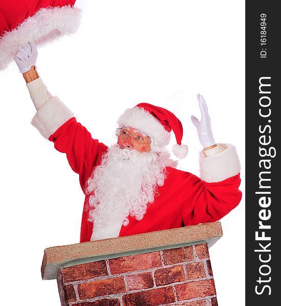 Santa slipping down a chimney followed by his sack. Isolated on white. Santa slipping down a chimney followed by his sack. Isolated on white.