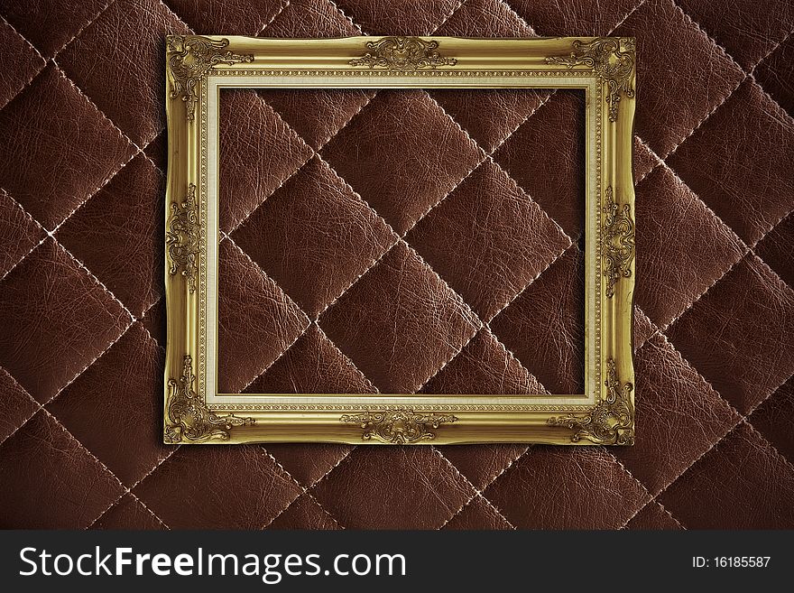 Golden frame on finishing leather. Golden frame on finishing leather
