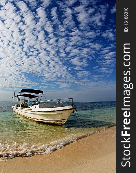 The relaxing and calm atmosphere at Kapoposang Island, Makassar, Indonesia, beautiful sky and cloud pattern, so pristine. The relaxing and calm atmosphere at Kapoposang Island, Makassar, Indonesia, beautiful sky and cloud pattern, so pristine