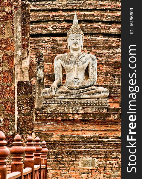 Buddha statue in the ruins of Sukhothai in Thailand