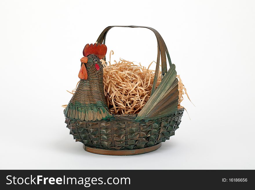 A basket with a chicken shape to it. A basket with a chicken shape to it.