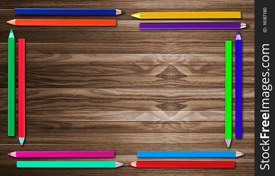 Colorful drawing pencils on blank paper. Colorful drawing pencils on blank paper