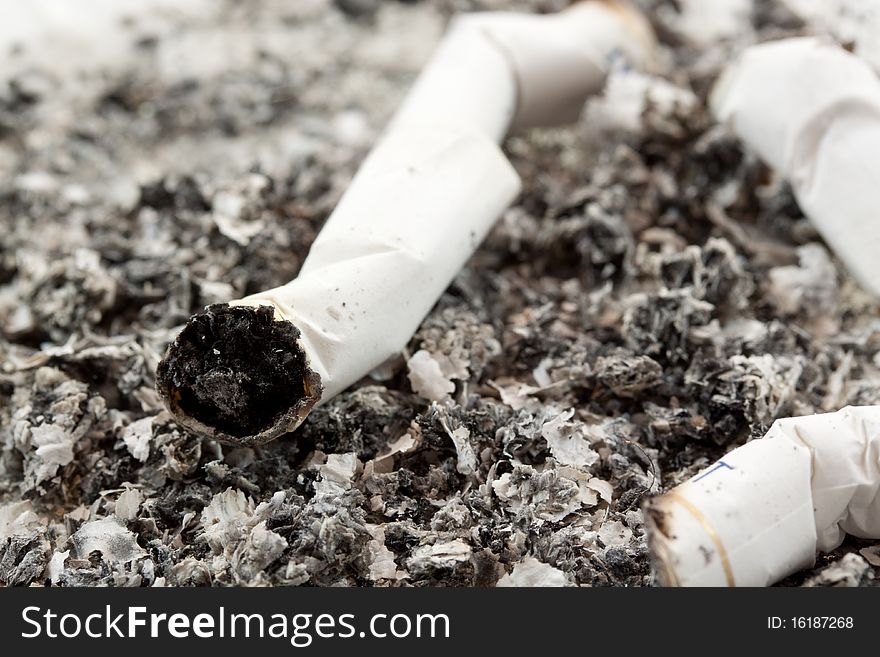 Close up image of cigarette and cigarette ash. Close up image of cigarette and cigarette ash