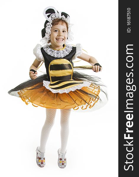 Small girl is bee costume. Flying bee.