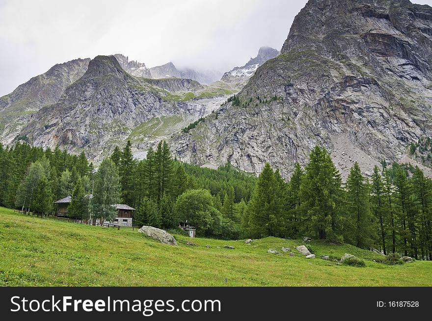 Foggy view of the Massif of Mont Blanc from the Italian. Foggy view of the Massif of Mont Blanc from the Italian