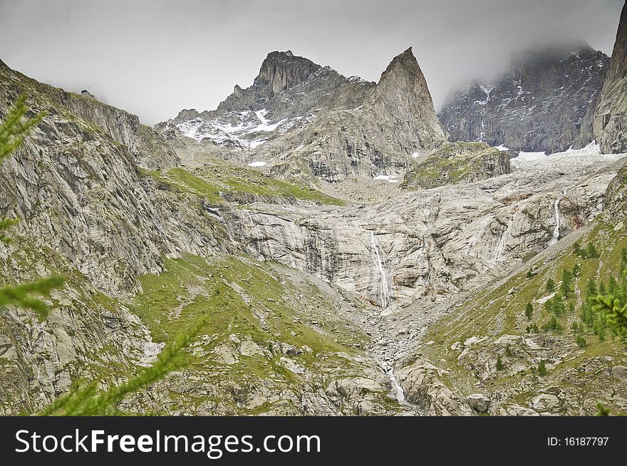 Foggy view of the Massif of Mont Blanc from the Italian. Foggy view of the Massif of Mont Blanc from the Italian