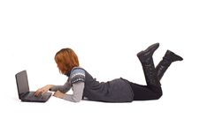 Girl In Knit Dress Lying And Looking At Laptop Stock Images Girl In Knit Dress Lying And Looking At Laptop Stock Images