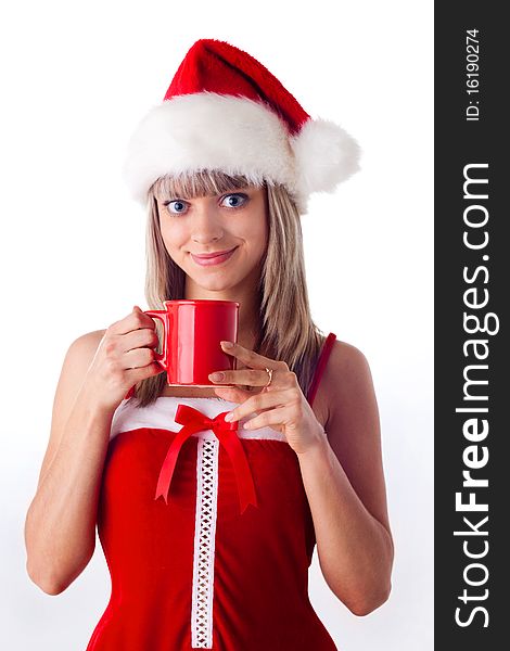 Santa girl holding a cup, drink. Holidays Christmas and New Year