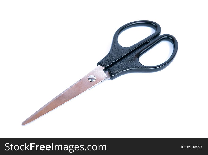 Scissors with black plastic pens on a white background