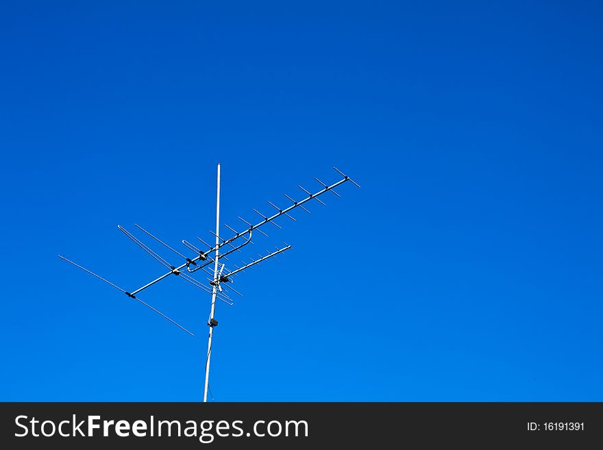 Home advance TV antenna on blue sky