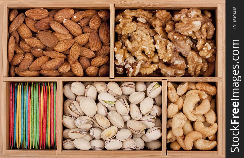 Nuts of different grades in a wooden box.