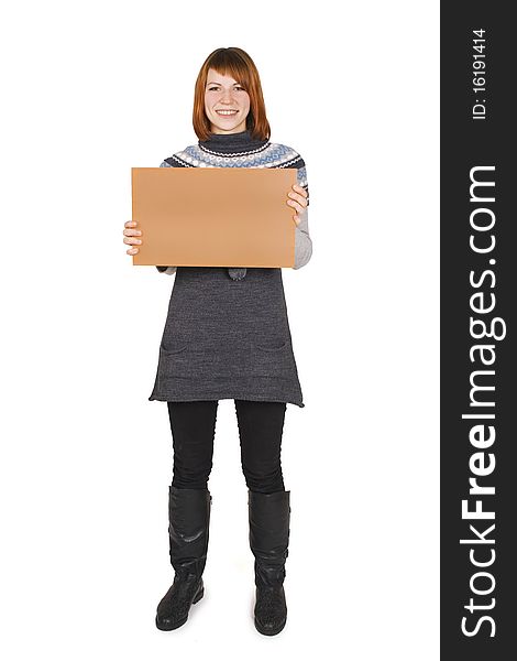 Girl standing and holding cardboard