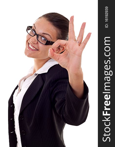 Attractive business woman satisfied with results - ok sign