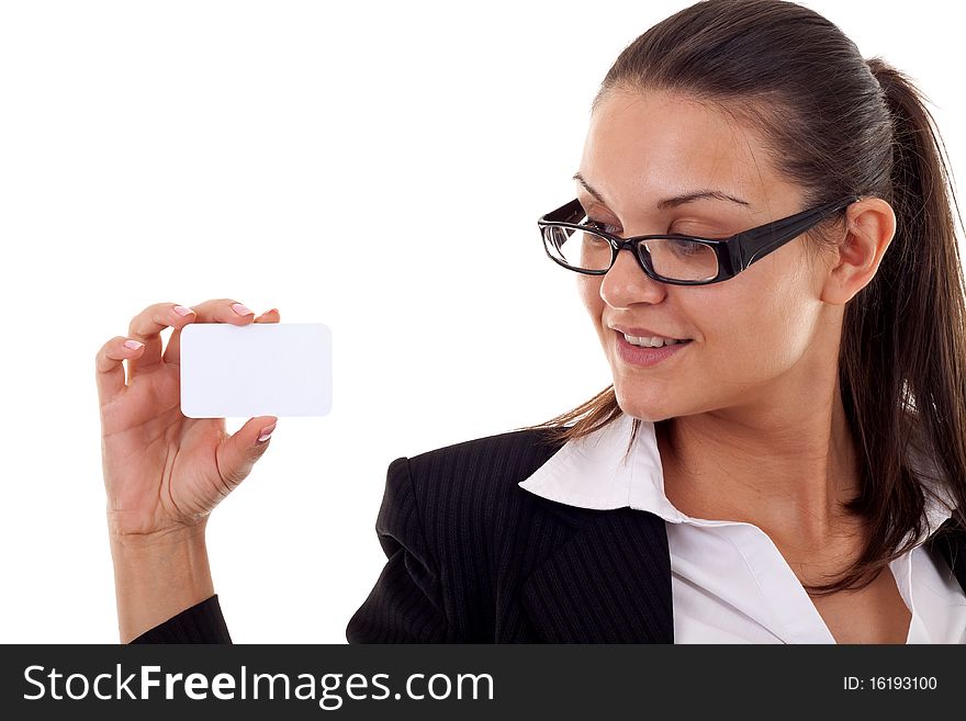 Business womanlooking at a business card over white. Business womanlooking at a business card over white