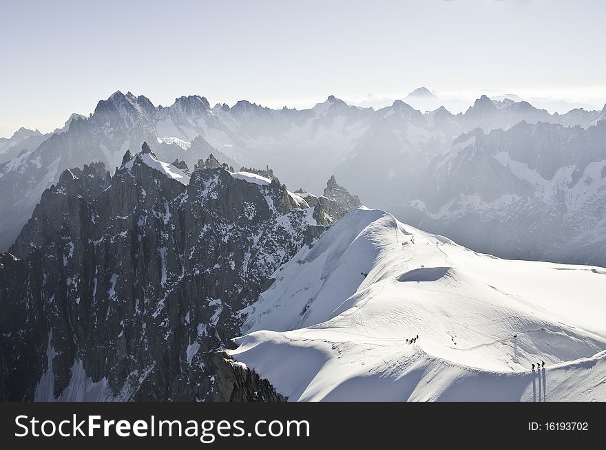 From the top of l'Aiguille du Midi (3842 m), the views of the Alps are spectacular. In this photo so you can see several climbers made the descent to the Plan de l'Aiguille. From the top of l'Aiguille du Midi (3842 m), the views of the Alps are spectacular. In this photo so you can see several climbers made the descent to the Plan de l'Aiguille.