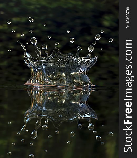 Detail view of splashing water drops on a refelctive water surface. 3D. Detail view of splashing water drops on a refelctive water surface. 3D