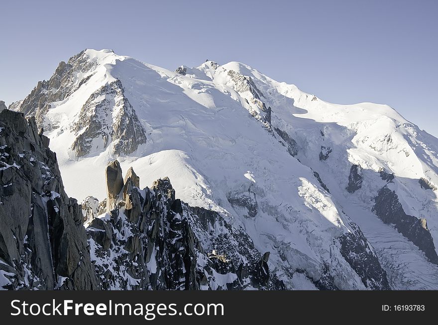 From the summit of l'Aiguille du Midi (3,842 m), the views of the Alps are spectacular. In this picture you can see the Mont-Blanc. Below on the right you can see the Glacier des Bossons. From the summit of l'Aiguille du Midi (3,842 m), the views of the Alps are spectacular. In this picture you can see the Mont-Blanc. Below on the right you can see the Glacier des Bossons