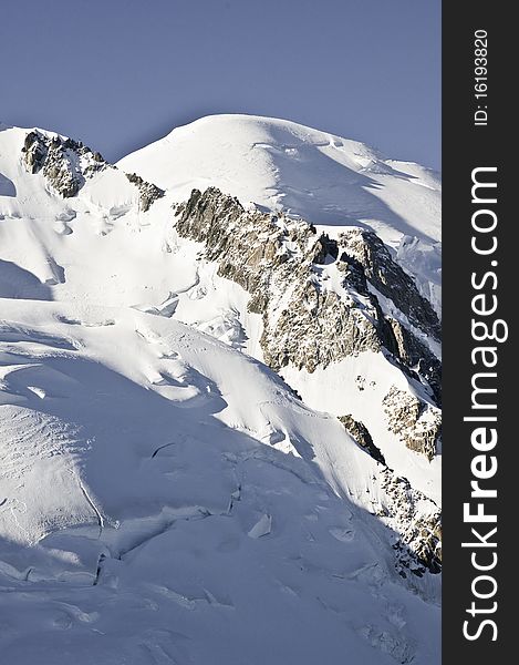 From the summit of l'Aiguille du Midi (3,842 m), the views of the Alps are spectacular. In this picture you can see the Mont-Blanc. From the summit of l'Aiguille du Midi (3,842 m), the views of the Alps are spectacular. In this picture you can see the Mont-Blanc