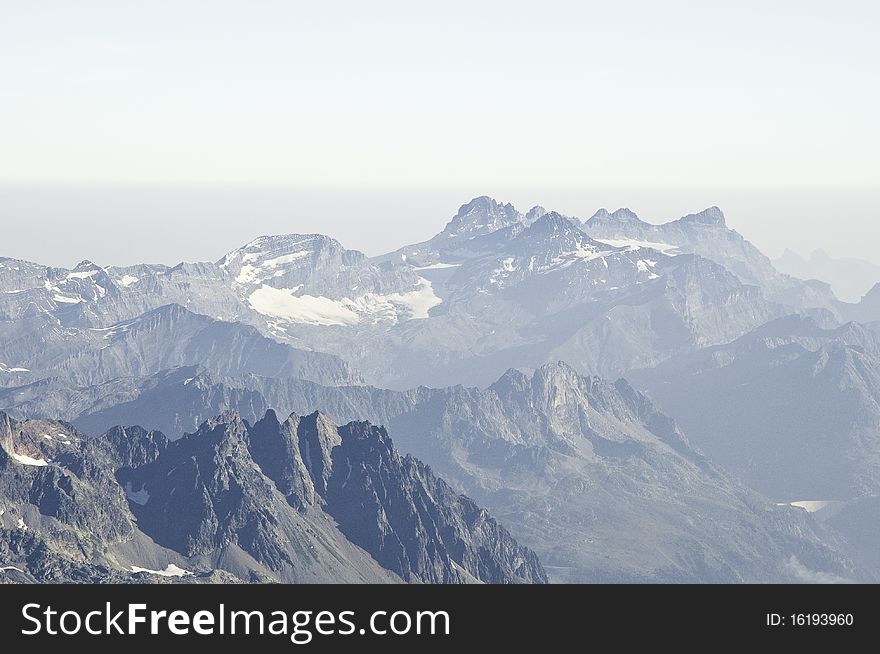 From the summit of l'Aiguille du Midi (3,842 m), the views of the Alps are spectacular. Views of Dents du Midi. From the summit of l'Aiguille du Midi (3,842 m), the views of the Alps are spectacular. Views of Dents du Midi