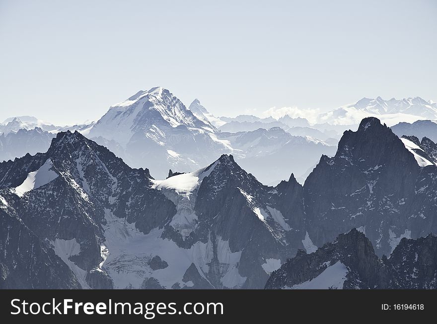 From the summit of l'Aiguille du Midi (3,842 m), the views of the Alps are spectacular. From the summit of l'Aiguille du Midi (3,842 m), the views of the Alps are spectacular.