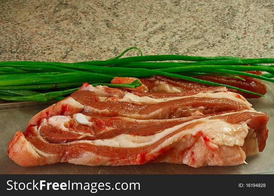 Raw meat with green onions