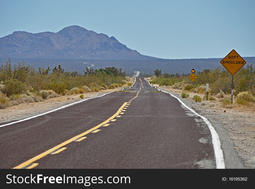 Lonesome highway in desert