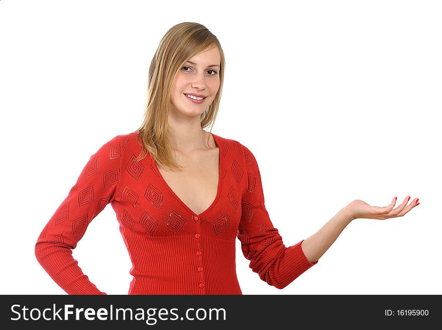 Smiling blonde young girl in red with advertise gesture on white background. Smiling blonde young girl in red with advertise gesture on white background