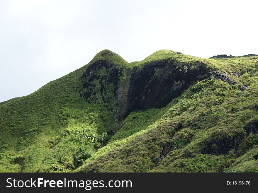 During the rainy season this waterfall would be active.  With is dry, it gets a lot of green growth over it making it a lush, tropical view. During the rainy season this waterfall would be active.  With is dry, it gets a lot of green growth over it making it a lush, tropical view.