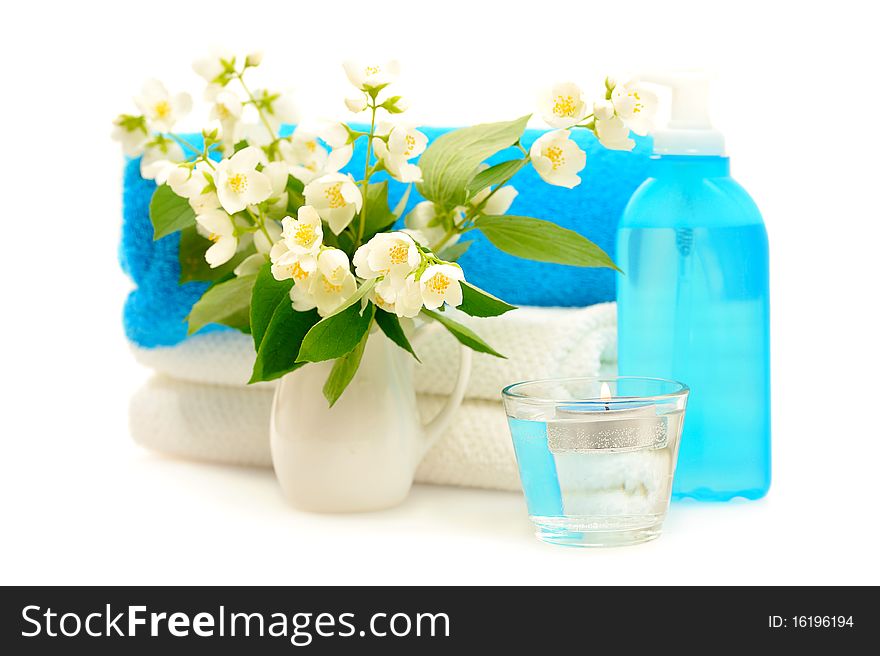 Blue spa with jasmin on white background