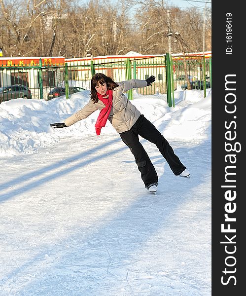 Girl on winter skate rink. Girl on winter skate rink