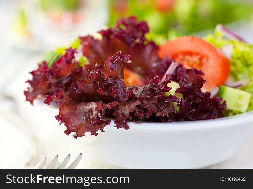 Closeup of delicious fresh vegetable salad