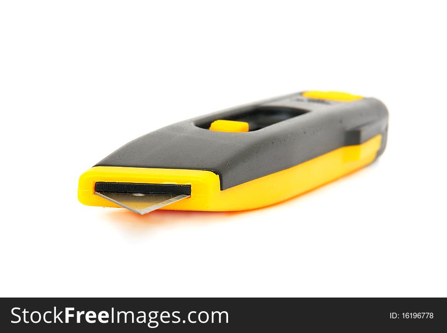 A box cutter isolated against a white background