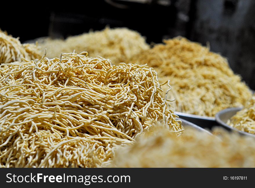 Bhujia Sev. A very famous snack from northern India. A paste of gram flour is fried in hot oil through a sieve.