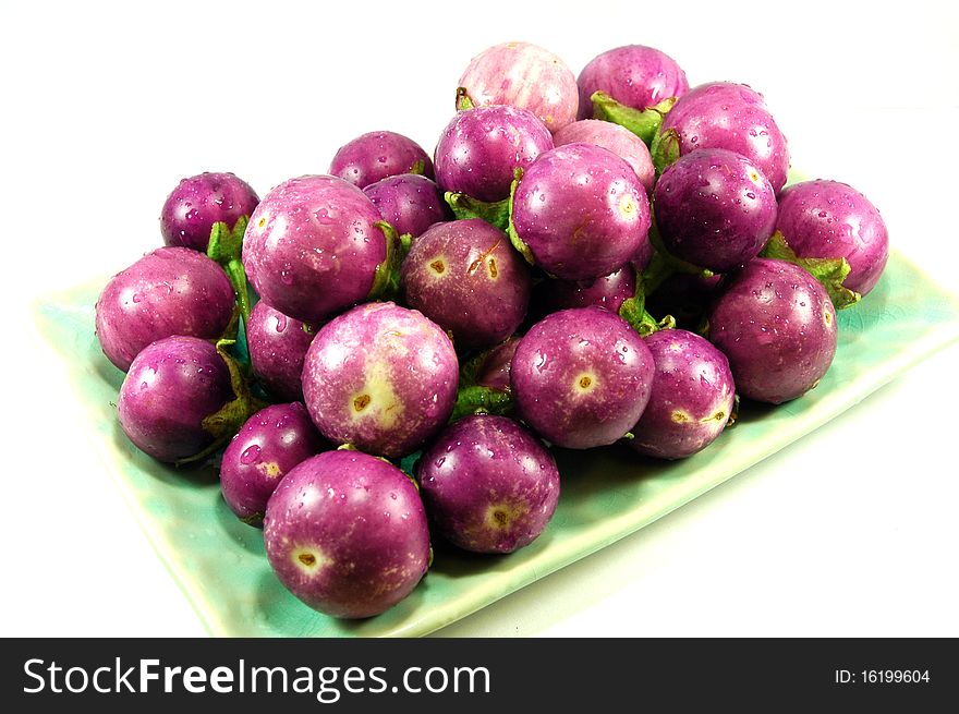 Thai purple eggplant (Makuea Praow) is used in curries, Som Tum, and is eaten raw