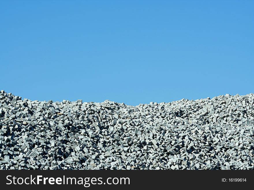 A Granite stone pile with blue sky