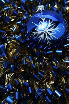 Christmas Glass Sphere On A Celebratory Tinsel Royalty Free Stock Photography Christmas Glass Sphere On A Celebratory Tinsel Royalty Free Stock Photography