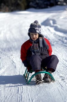 Boy On Sled Royalty Free Stock Photo Boy On Sled Royalty Free Stock Photo