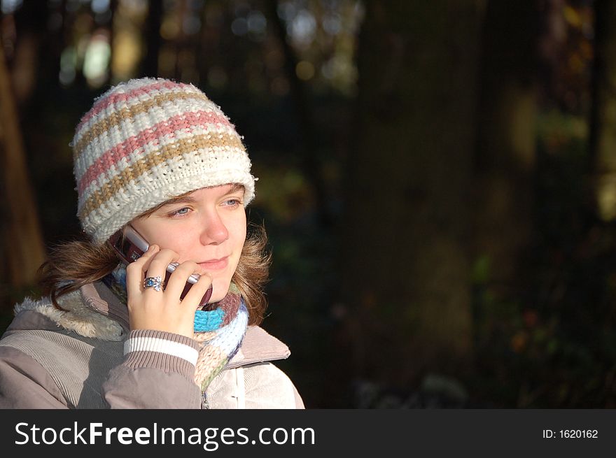 Girl calling on a cell phone