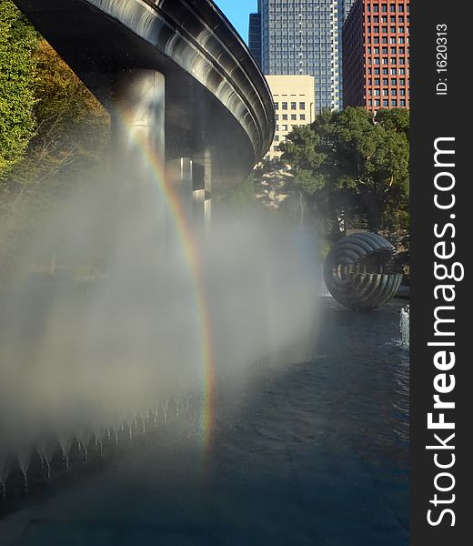 Color rainbow in modern in city fountain
