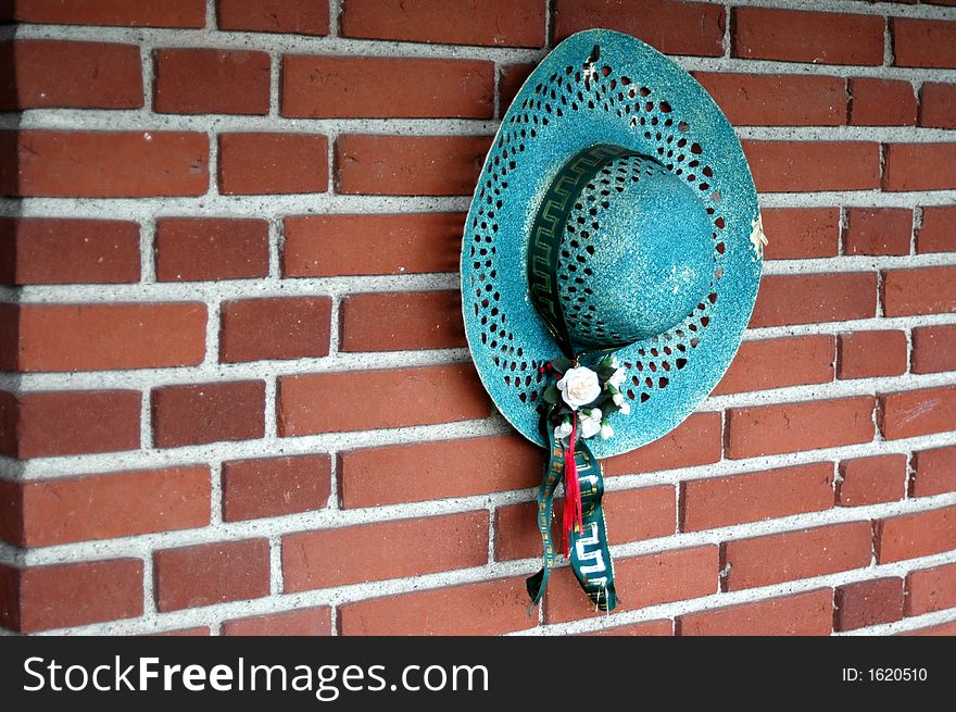 A blue hat on the wall